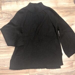 Woman’s Calvin Klein Wool/ Acrylic blend soft black turtle neck sweater. Size S.